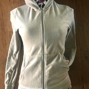 A zippered Hoodie with pockets.
